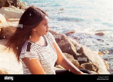 Beautiful Young Girl Thinking In Nature Stock Photo Alamy