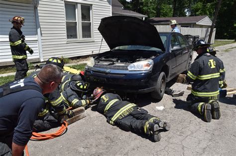 Video Captures Dramatic Ifd Rescue Of Man Trapped Under Car Wish Tv