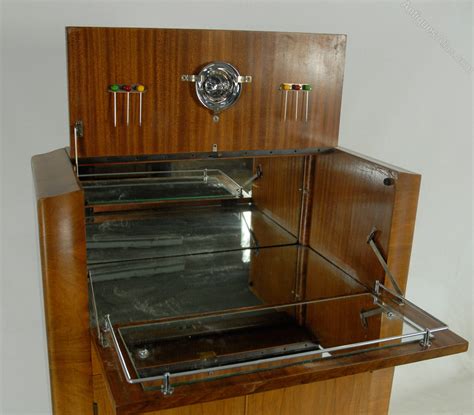 Simple yet stylish, the claridge circle link 2 door cabinet isn't your typical piece. Art Deco Walnut Cocktail Cabinet By Rivington - Antiques Atlas