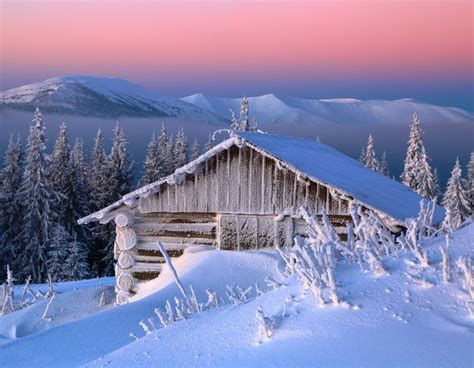 Old Wooden Hut Huge Snowdrifts Around Background Of The High