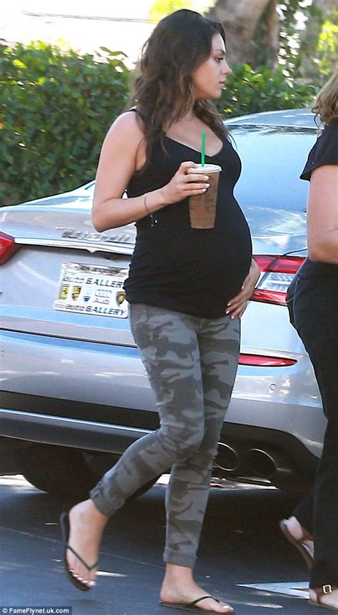 Pregnant Mila Kunis Dons Skinny Jeans As She Enjoys Iced Coffee Daily