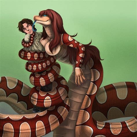 A Woman Is Hugging A Large Snake