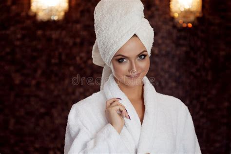 Spa Treatments Beautiful Woman In Bathrobe And Towel On Head Stock
