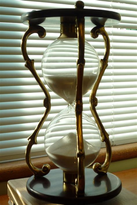 Just minutes before the deadline, he definitely submitted his assignment at the eleventh hour. Hourglass | It was golden hour in my office. I was on a ...