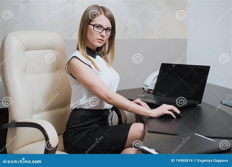 Business Woman Is Sitting At The Desk In Office Stock Photo Image Of