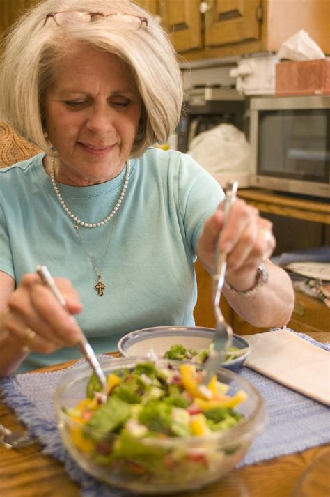 Salad Free Stock Photo A Woman Eating A Fresh Salad 17230