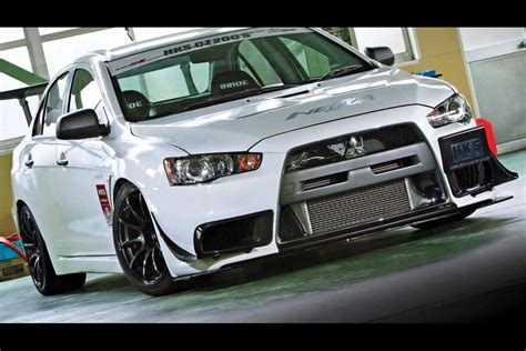 The mitsubishi lancer has stopped being produced in the local market for the last few years. mitsubishi lancer evolution 2014 - YouTube