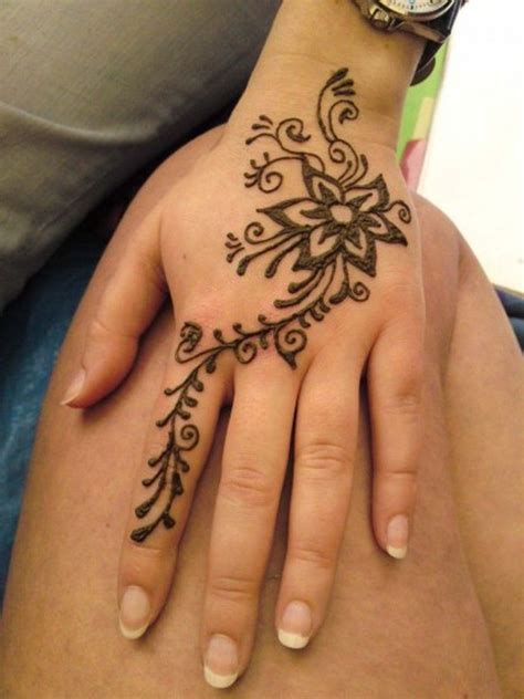 Here is a full hand design using pretty simple motifs that beginners can do! Floral henna tattoo design on hand | Tattoos Book | Henna ...
