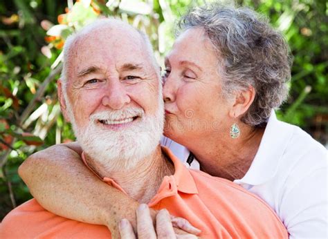 Senior Couple Affectionate Kiss Stock Photo Image Of Lovers
