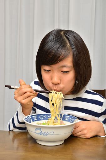 You'd swear the asian soup broth is from a chinese restaurant, it's that good. Girls Eating Chinese Noodle Stock Photo - Download Image ...