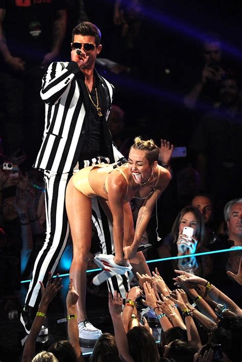 Miley Cyrus’s Performances Photos Of Her Wildest Moments Ever Hollywood Life