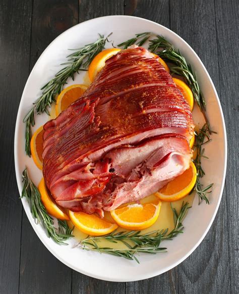 Christmas dinner is a time for family, fun and, most importantly, food! Easy Orange Honey Ham - Perfect for Easter or Christmas Dinner