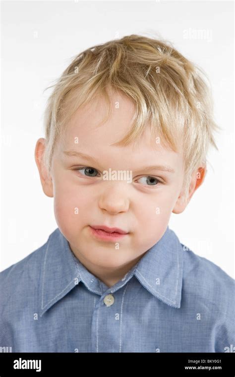 Small Boy Making Faces Stock Photo Alamy