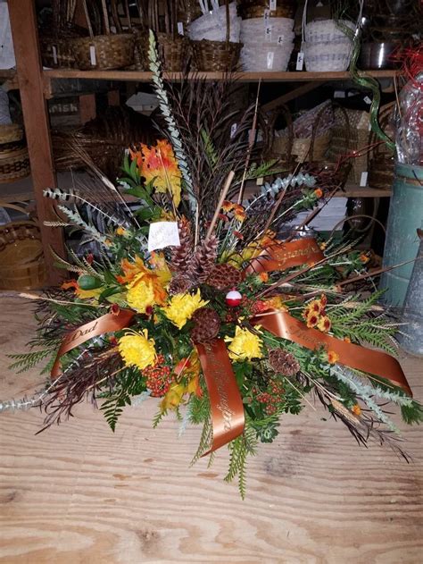 Flowers can create a beautiful effect on a funeral so don't rush. Men's casket spray outdoorsy very masculine | Funeral ...