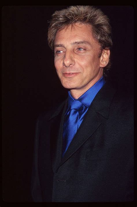 Singer Barry Manilow Stands At The Premiere Of The Film The Mirror Has