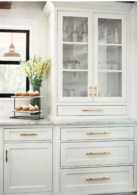 White Glass Front Kitchen Cabinets How To Utilize Glass Front Cabinets In Your Kitchen Glass