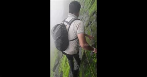 Trekker Shows Off Terrifyingly Slippery Climb Along Cliff Edge In West