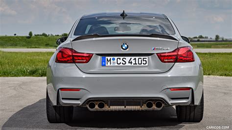Competition paketi stavljaju dodatni akcent na performanse uz modifikovane motore, menjače, ogibljenje, ali i trim enterijera, aerodinamiku i neke spoljne u novoj epizodi nedeljne trke ubrzanja carwowa, „na crtu su stavljeni m2 competition i m4 competition. 2018 BMW M4 CS (Color: Lime Rock Grey Metallic) - Rear | Caricos
