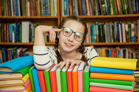 Girl In Glasses With Books In The Library Stock Image Image Of