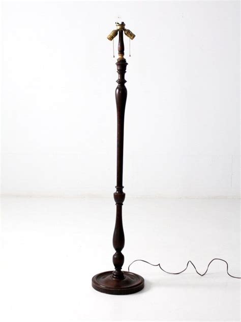 Tall wooden floor lamp lends a traditional touch to your space. antique turned wood floor lamp, Victorian era double ...