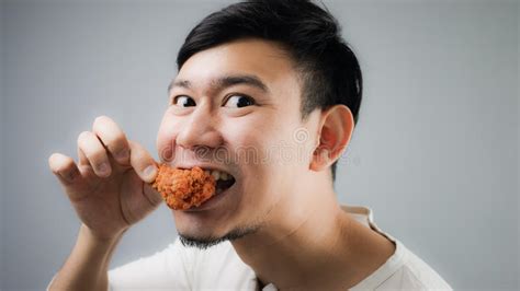 137 Asian Fat Man Eating Fried Chicken Stock Photos Free And Royalty