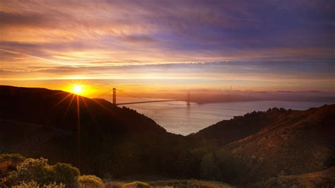 1366x768 Sunrise Over The Golden Gate 1366x768 Resolution Wallpaper Hd