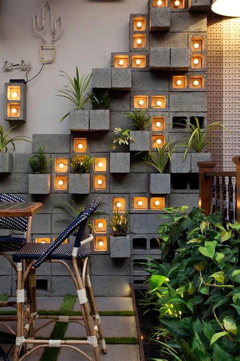 Build a concrete block wall: A Concrete Block Planter Wall Was Used To Add Greenery To ...