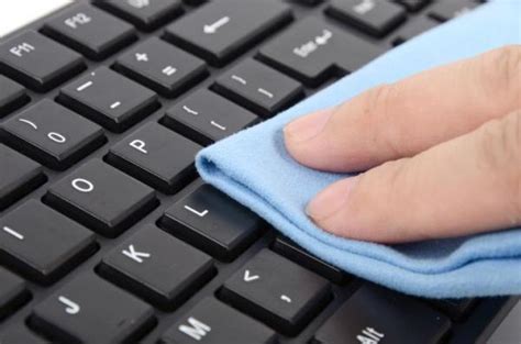 Keeping your laptop's keyboard clean. How to Clean a Sticky Keyboard Without Removing the Keys ...