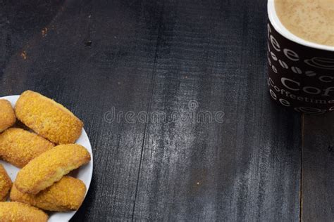 Morning Coffee With Milk And Cookies On A Dark Table Stock Image