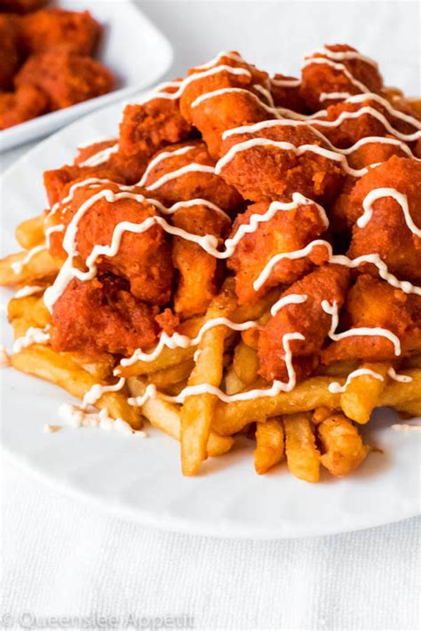 Fried buffalo chicken made with buttermilk soaked extra crispy chicken tenders dredged in a delicious and easy to make homemade honey buffalo sauce. Buffalo Chicken Fries ~ Recipe | Queenslee Appétit