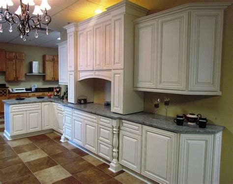 The only thing we had a problem with was early on before they cured for a few weeks, the drawers stuck in a couple of spots before i fronts of cabinets were painted by hand and the sides and tops sprayed. Image result for angled kitchen cabinet | Antique white ...