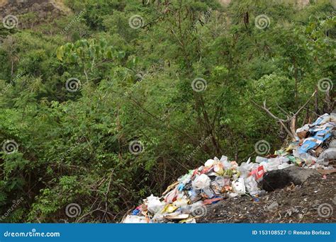 Trash Garbage Piles Thrown Along Mountain Side By Uncaring And