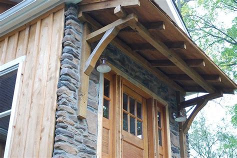 The best garage doors that complement these homes are the classic wood designs, which can stand up to damage caused by cars, kids and even. Timber Frame Porch | Timber frame porch, Door overhang ...