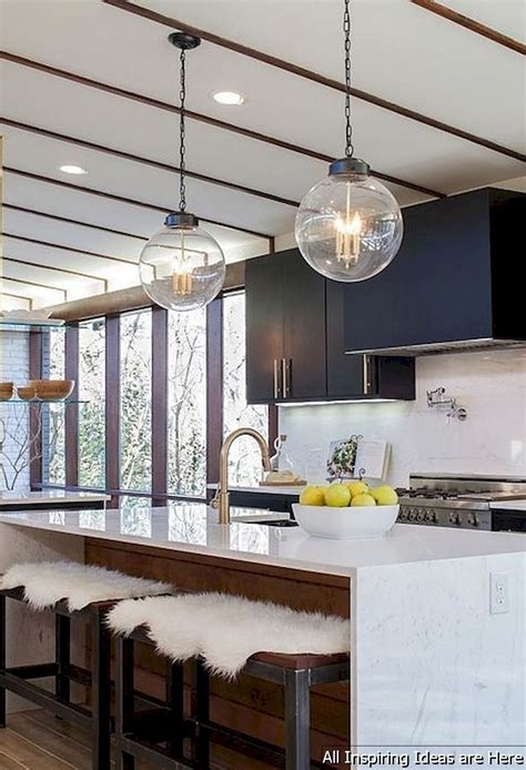 The high ceilinged cooking area fits well this mid century kitchen shows a smart mix of white quartz and wood in the kitchen island. Cool 32 Insane Midcentury Modern Kitchen Decor Ideas https ...