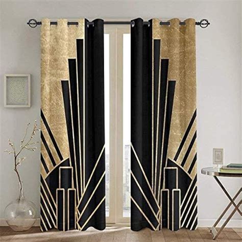 An Art Deco Style Window Curtain With Black And Gold Stripes On The Outside In Front Of A White