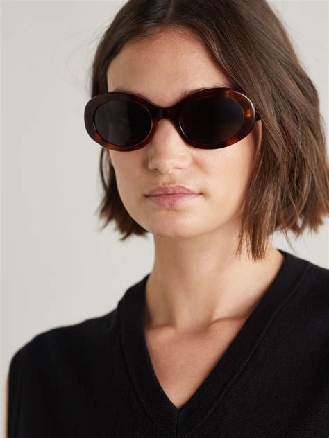 celine eyewear triomphe oval frame tortoiseshell acetate sunglasses net a porter