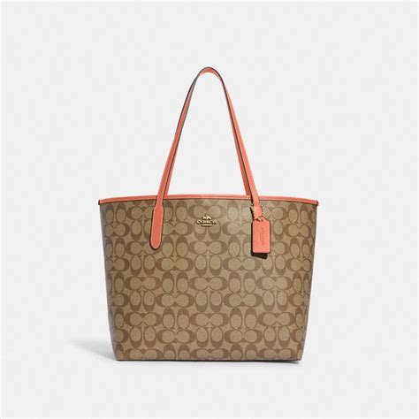 Coach Outlet® City Tote In Signature Canvas