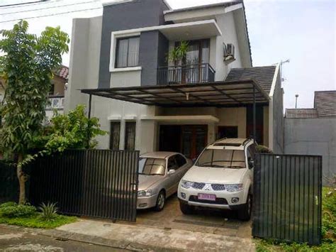 Meski perhitungan bentuk bangunannya akan lebih rumit bagian garasi dibuat lebih rendah dibandingkan rumah, dan ada tangga kecil yang cukup tinggi disamping garasi sebagai akses menuju pintu depan. Desain Garasi Mobil Rumah Minimalis | Juliana Kenzi Site