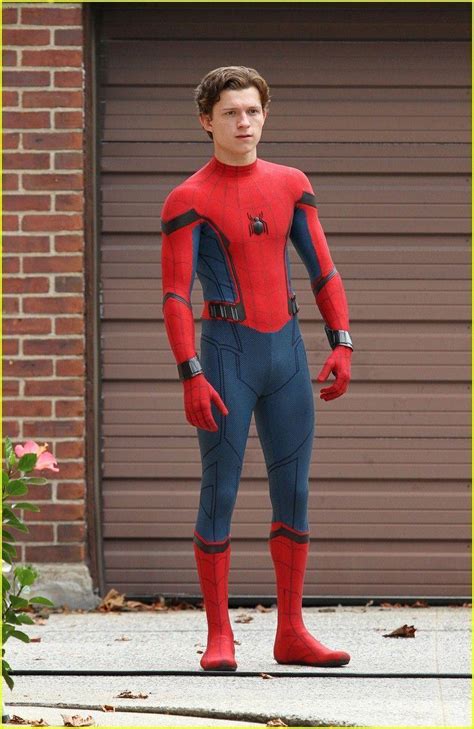 Tom Holland In Spider Man Suit Wallpaper