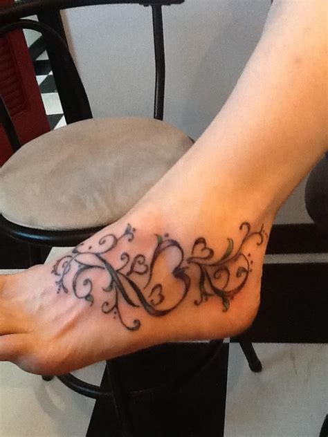 Maybe you would like to learn more about one of these? heart tattoos with names in them - Tattoo Maze