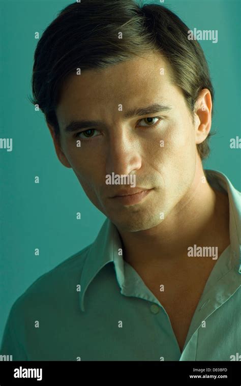 Handsome Man Looking Seductively At Camera Portrait Stock Photo Alamy