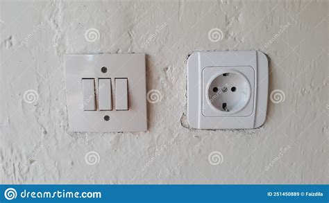 Switch And Electric Socket And White Wall Switch And Electric Socket
