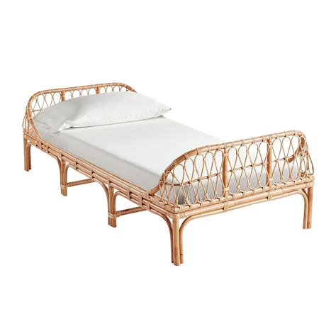 Formed from naturally durable rattan reeds, this curved bed nods to british colonial furniture, providing a captivating centerpiece to any bedroom that doesn't take up too much visual weight. Cass Honey Rattan Twin Daybed in 2020 | Daybed, Twin bed