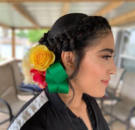 Mexican Girl With Flowers In Her Hair