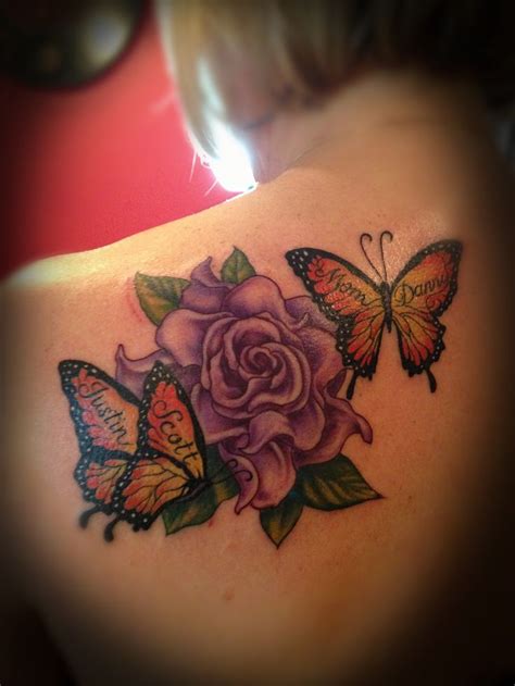 Butterfly With Flowers Tattoo Butterfly Tattoo Tattoos