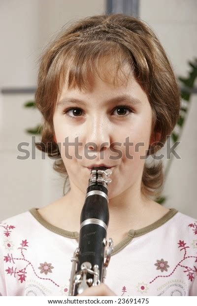 Young Girl Playing Clarinet Stock Photo 23691475 Shutterstock