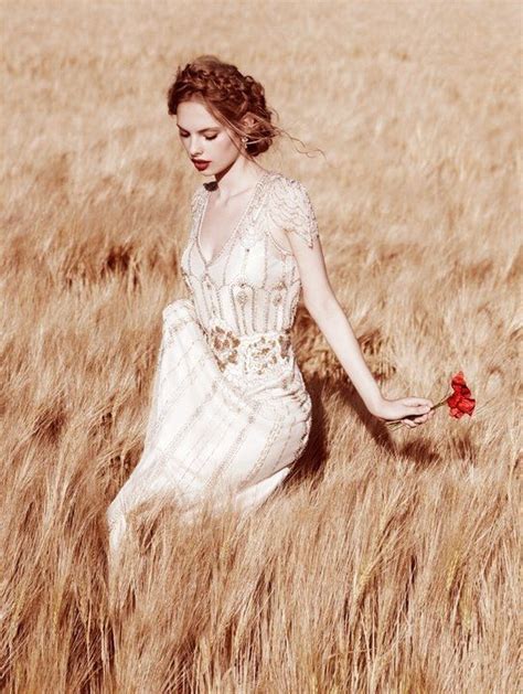 Woman Strolling Thru A Wheat Field Pictures Photos And Images For