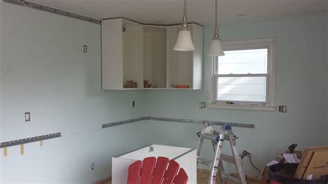 How to install kitchen cabinets. Cabinet Installation Round 2: Hanging Ikea Cabinets ...