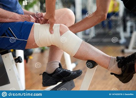 Wrapping Knee Injury Stock Photo Image Of Closeup 147425578