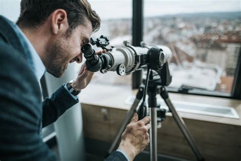 People Looking Through Telescope Stock Photos Pictures And Royalty Free